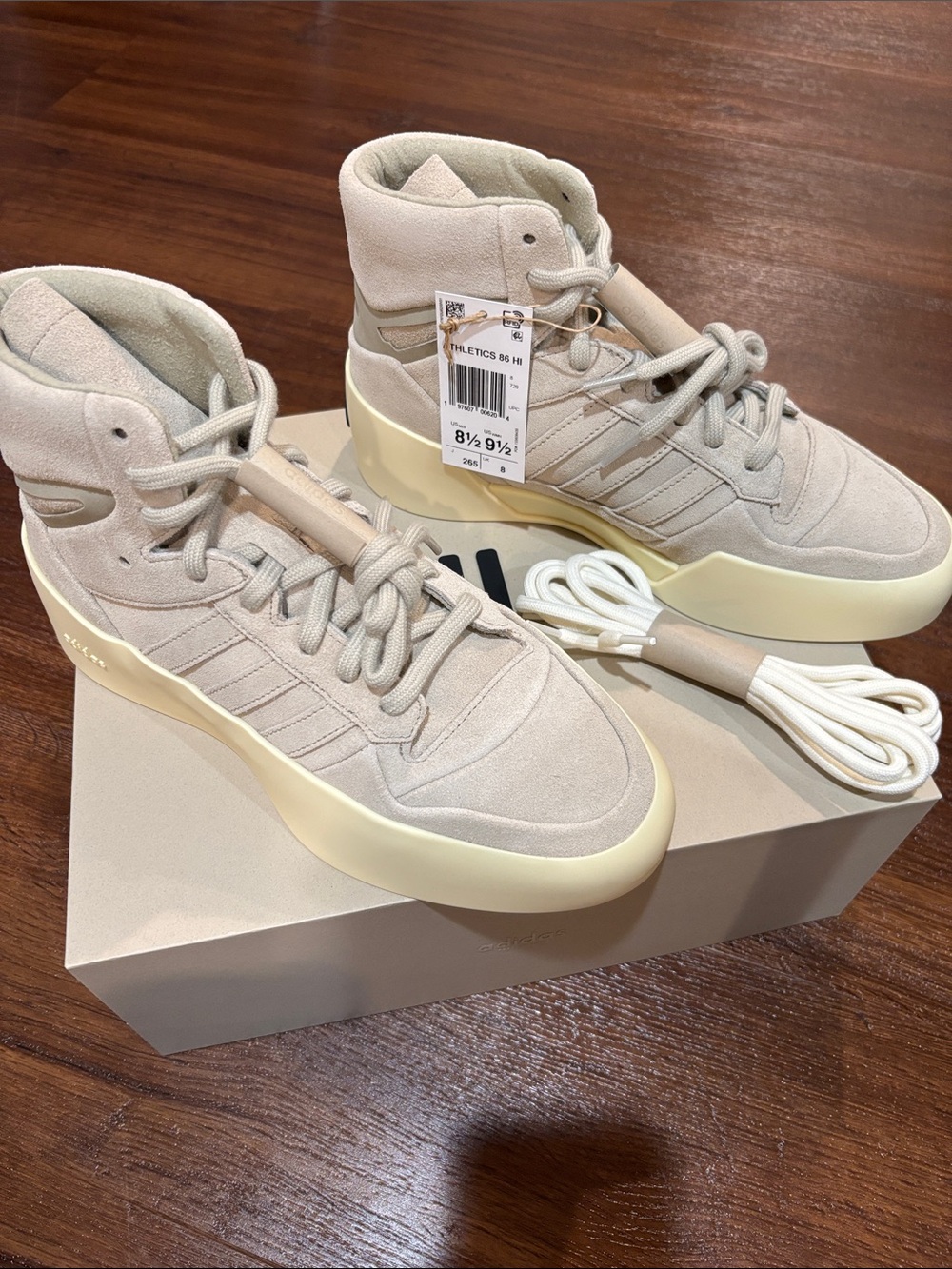 ADIDAS FEAR OF GOD ESSENTIALS Suede size (men 8.5/women 9.5).  New